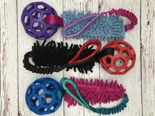 Zseníliás húzogatós játék HOL-EE ROLLER labdával